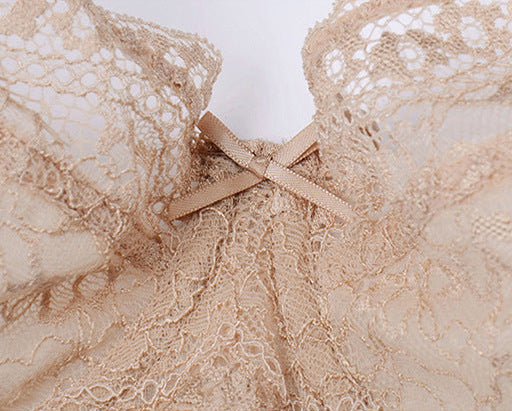 Lace bra detail with decorative bow accent
