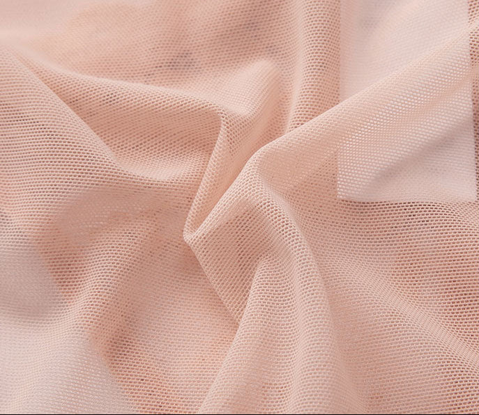 Close-up of sheer mesh fabric detail on pink lace panty - Seriva Lingerie